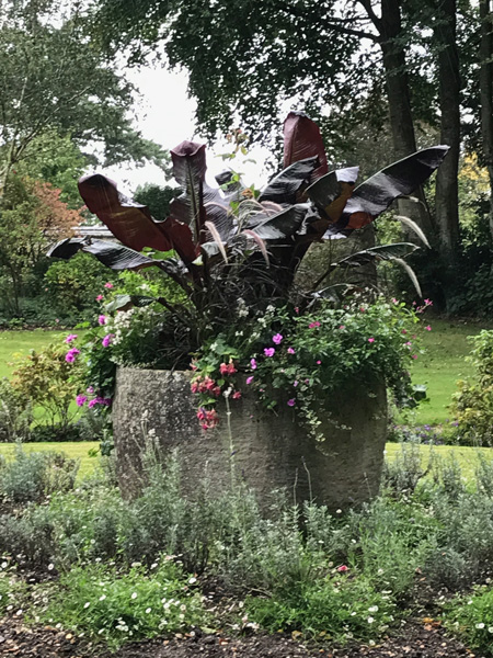 Round stone trough garden platner